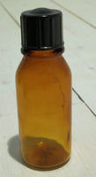 Medicine bottle with pouring spoutFloby Överskottslager