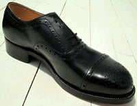 Low shoe 40 figure in black leather, brochure pattern-Floby Överskottslager