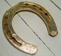 Horseshoe in gold colorFloby Överskottslager