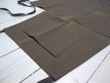 Gray brown cotton apron with chest pocketFloby Överskottslager