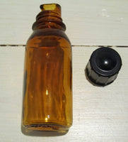 Medicine bottle with pouring spoutFloby Överskottslager