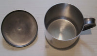 Mug with ear and lid in stainless steelFloby Överskottslager